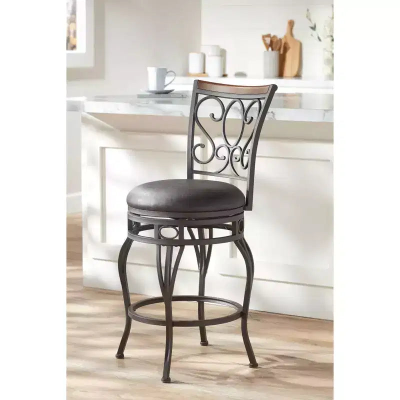 Sgabello da bar girevole Trevi Bronze marrone, altezza 67,3 cm, con cuscino tradizionale in similpelle e schienale, poggiapiedi per bancone da cucina